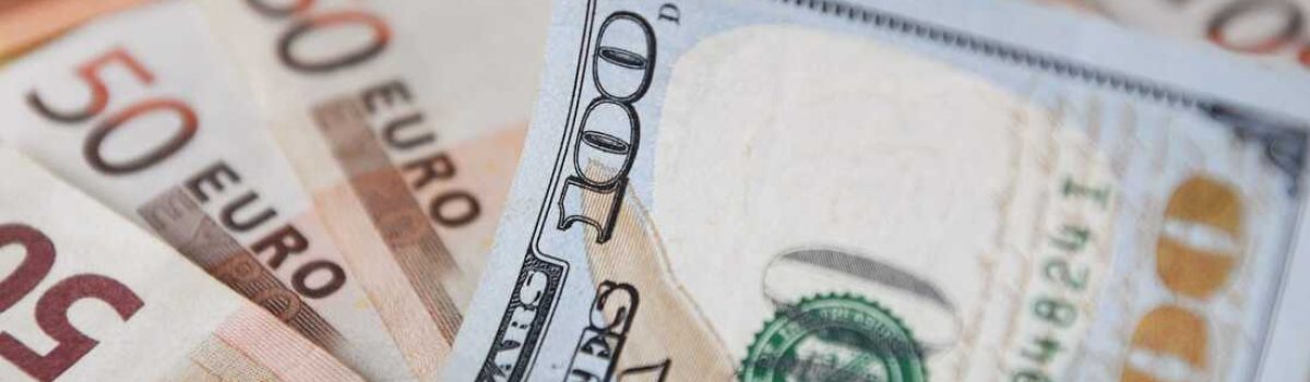A $100-dollar bill is seen on top of Euro bills in Bogota, on July 12, 2022. - The euro struck parity with the dollar for the first time in nearly 20 years on Tuesday as a cut in Russian gas supplies to Europe heightened fears of a recession in the eurozone. (Photo by DANIEL MUNOZ / AFP) (Photo by DANIEL MUNOZ/AFP via Getty Images)